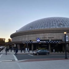 UConn basketball players competing in an arena