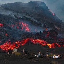 Molten lava flowing down Mount Etna in Sicily.