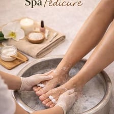 A person receiving a pedicure at a spa.