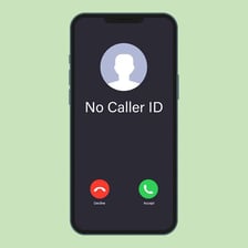 A phone displaying an incoming call with the number hidden.