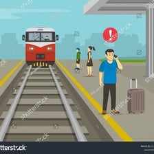 A traveler makes a phone call after arriving at a station.