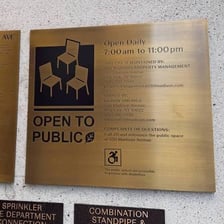 A posted rules sign in a public space.