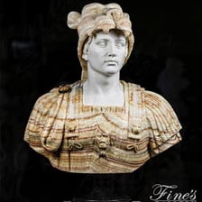 A marble bust displayed in a museum.