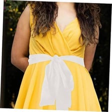 A robe fastened around the waist with a sash