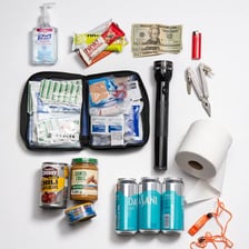 A packed emergency go bag with basic supplies