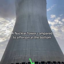 A very large object shown beside a person for scale