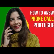 A person answering a telephone