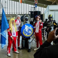 A convention attendee wearing a character costume.