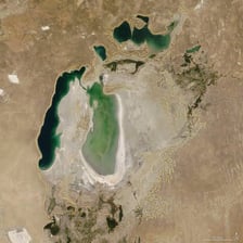 An aerial view of the North Aral Sea and its surrounding dry landscape.