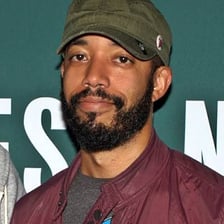 Wyatt Cenac performing or posing in a comedian's portrait