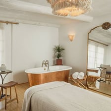 A tranquil spa treatment room prepared for guests.