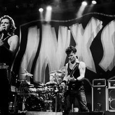 The rock band INXS performing onstage.