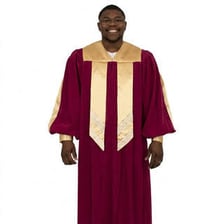 A choir wearing matching robes during a church service.