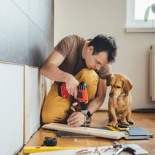 A person carrying out a home improvement project without professional assistance.