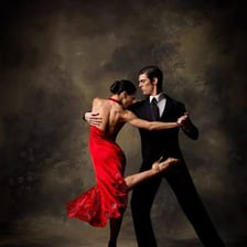 A pair of dancers performing a dramatic tango.
