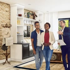 A real estate agent showing a house to a prospective buyer
