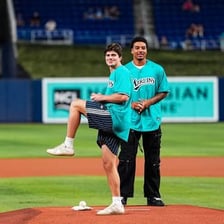 A Miami Marlins player wearing the team's uniform on a baseball field.