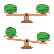An object tipping because most of its weight is at the top.