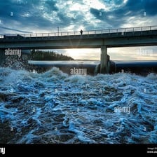 A bridge extending across a wide river