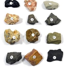 A rock specimen containing visible metallic ore.