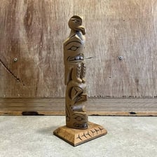Carved Indigenous totem figures