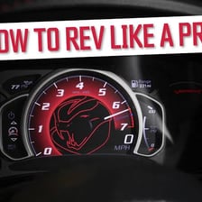 A car tachometer showing a high engine speed