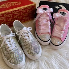 Casual Vans sneakers shown alongside Converse sneakers.