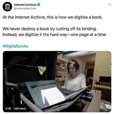 A person looking quickly through the pages of a book.