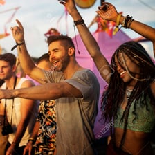 A person enthusiastically enjoying music at a concert.