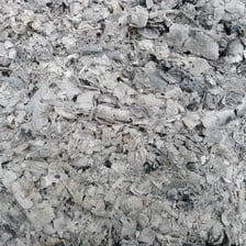 Gray ash remaining after material has burned
