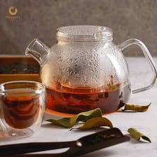 Tea leaves steeping in hot water