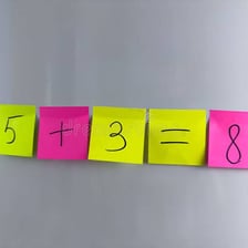 A simple visual showing three objects combined with five objects to make eight.