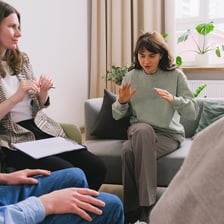 A person behaving impolitely during a conversation.
