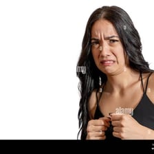 A person showing strong dislike through facial expression