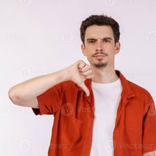 A person visibly expressing mild disapproval.