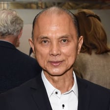 A portrait of shoe designer Jimmy Choo.