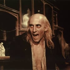A theatrical depiction of Igor assisting Frankenstein