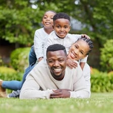 A family group including parents and siblings