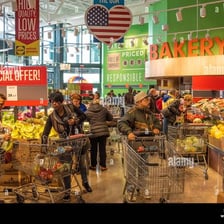 The storefront of a busy retail market