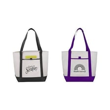 Reusable canvas tote bags displayed as promotional trade-show giveaways