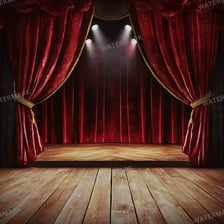 A theatrical stage with constructed scenery and backdrops