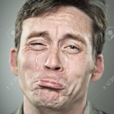 A person crying intensely
