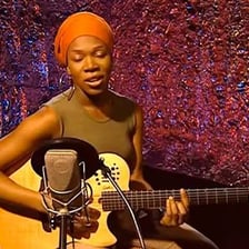 India.Arie performing on stage