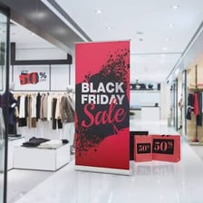 Shoppers browsing a store during a Black Friday sale