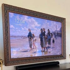 A television with its picture visible on the screen.