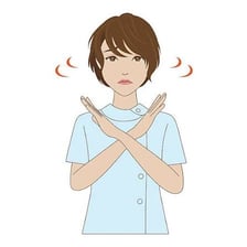 A person emphatically indicating denial by shaking their head