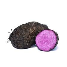 A purple yam shown whole and cut open