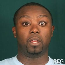 A person showing sudden realization with a surprised expression