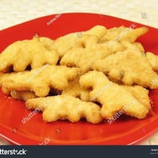 Chicken nuggets shaped like small dinosaurs