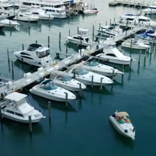 A boat tied securely to a dock